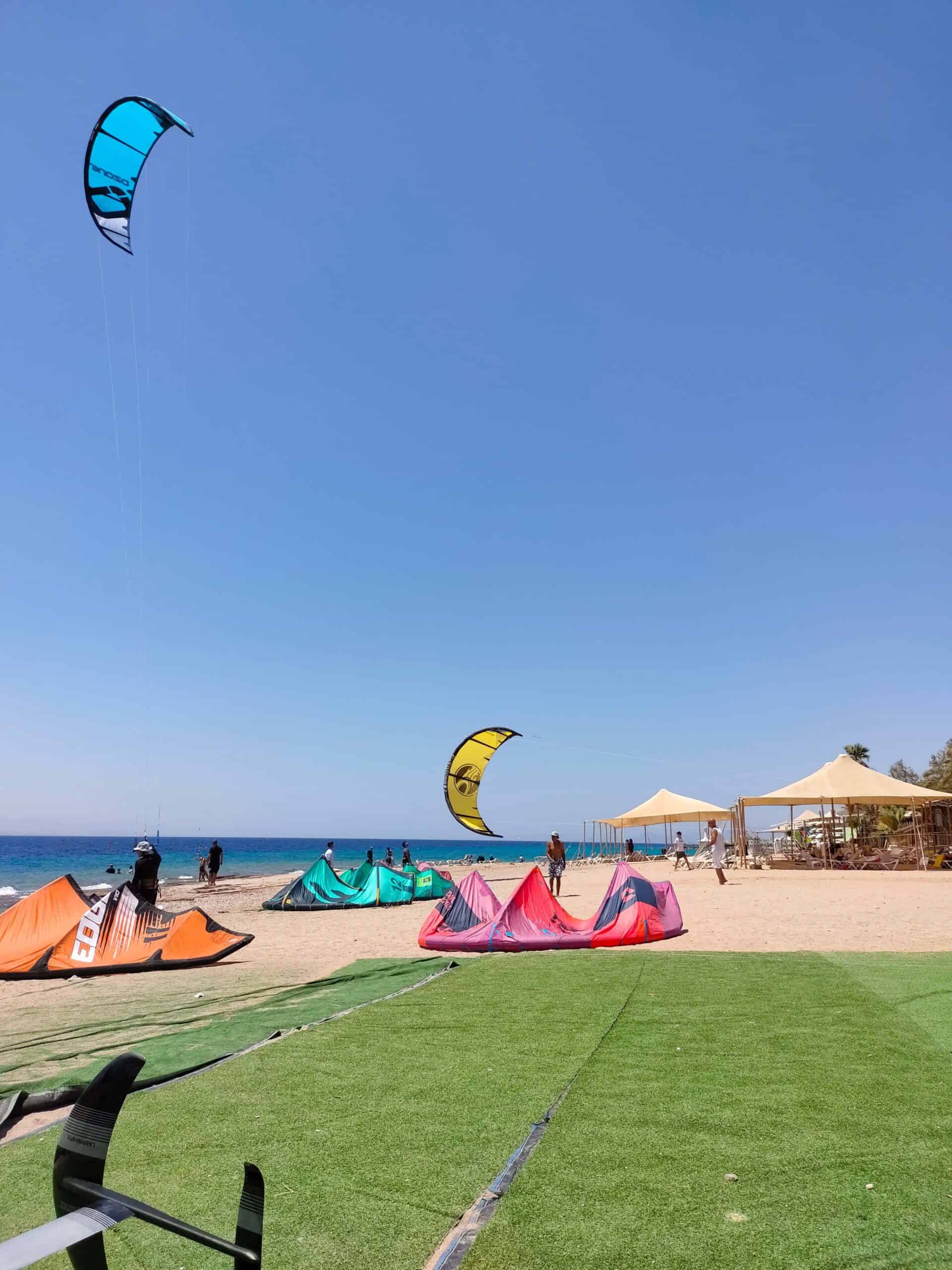 kitesurfing beach safety pre-launch check on sandy beach