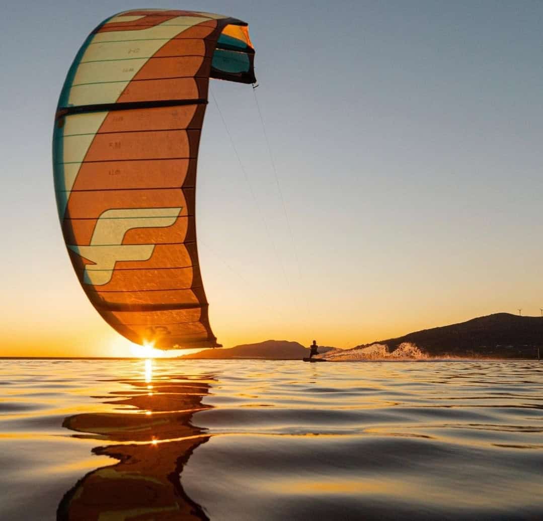 kitesurfing for heavier riders showing larger rider on board riding confidently